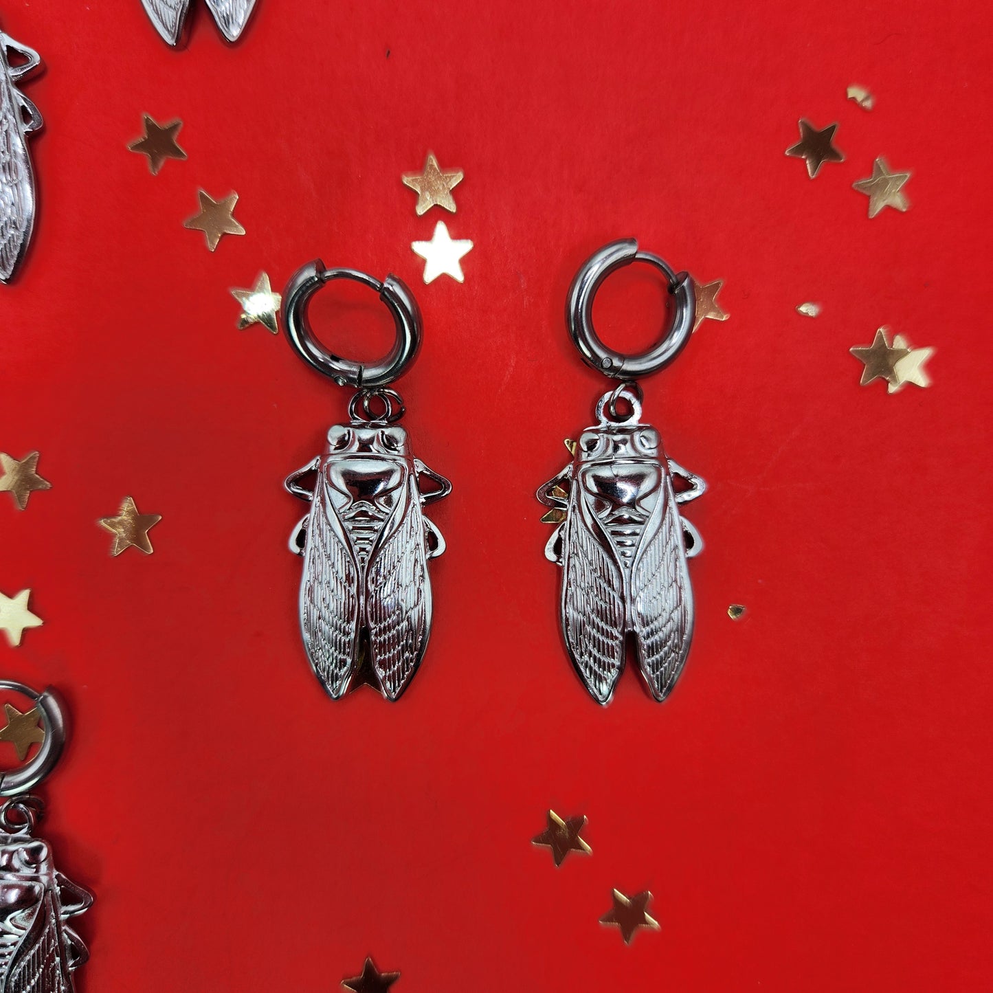 Boucle d'oreille Cigale